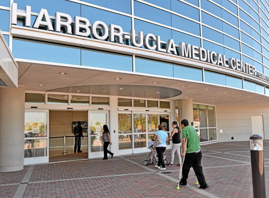 People sitting in a bright waiting room